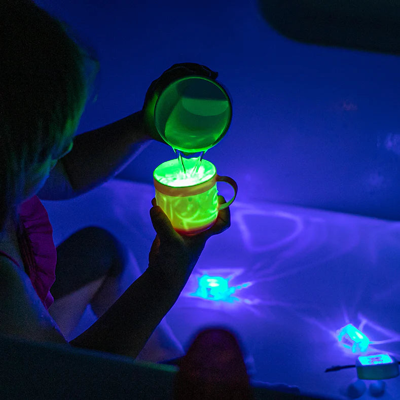 Glo Pals green light-up cubes in mug Water-activated sensory bath toys Green light-up cubes for bath time Glo Pals sensory cubes for kids BPA and phthalates free bath toys